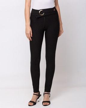 striped jeggings with belt accent