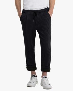 striped pleat-front slim trousers
