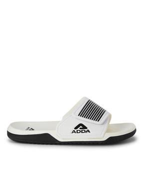 striped slides with brand print