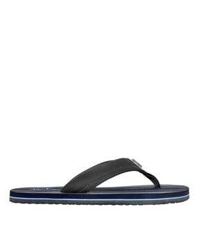 striped thong-style flip-flops