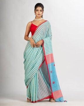 striped jamdani saree with tassels