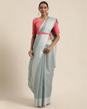 striped net saree with tassels