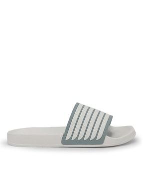 striped open-toe slides