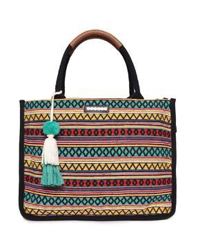 striped pattern tote bag with tassels accent