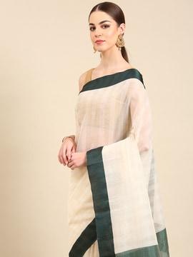 striped saree with contrast border and tassels