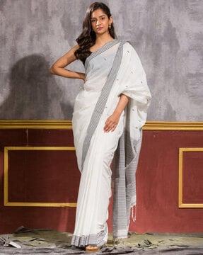 striped saree with tassels