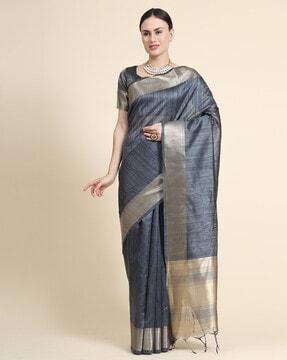 striped saree with tassels