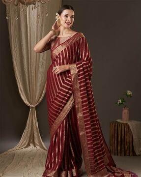 striped saree with tassels