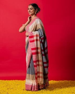 striped saree with tassels