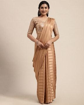 striped satin saree with sequined blouse piece