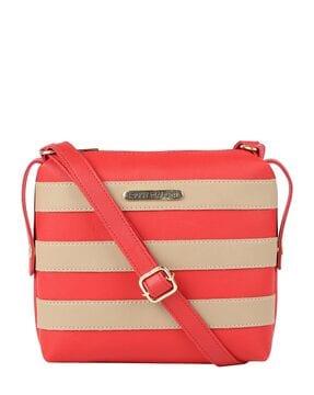 striped sling bag with adjustable strap