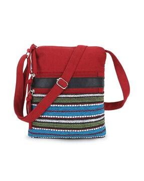 striped sling bag with adjustable strap