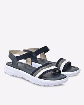 striped slip-on sandals with ankle strap
