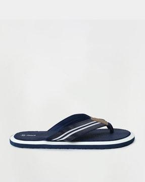 striped thong-style flip-flops