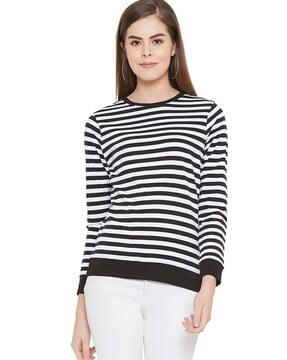 striped top with ripped hems