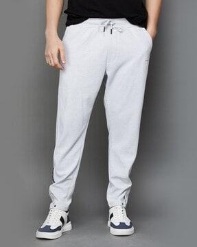 striped track pants with elasticated drawstring waist