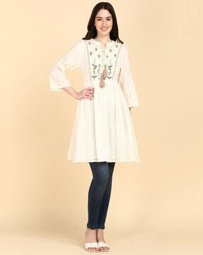 striped tunic with embroidered yoke