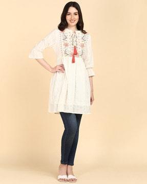 striped tunic with embroidered yoke