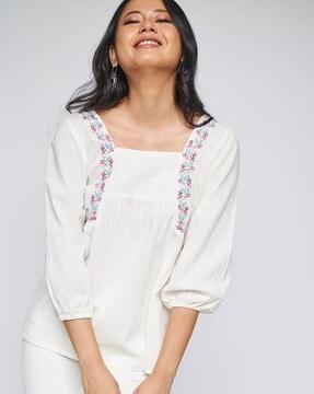 striped tunic with embroidery accent