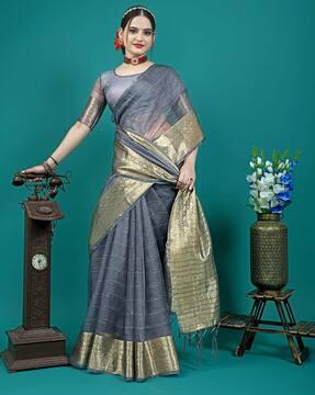 striped woven saree with contrast border & tassels