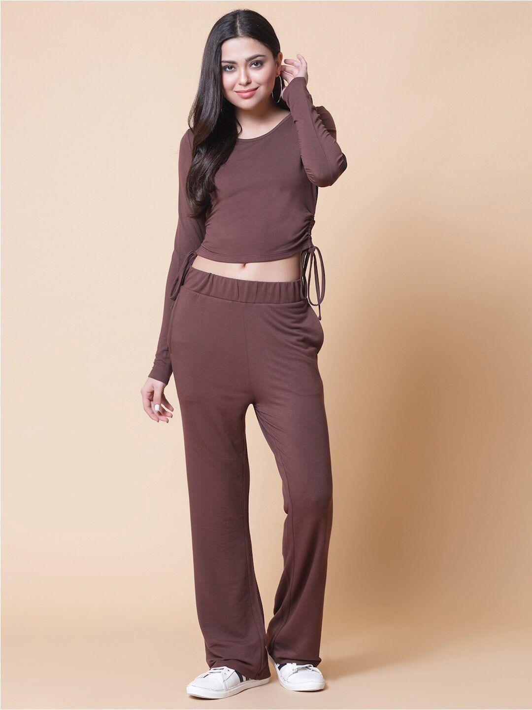 strong and brave women brown top with trousers