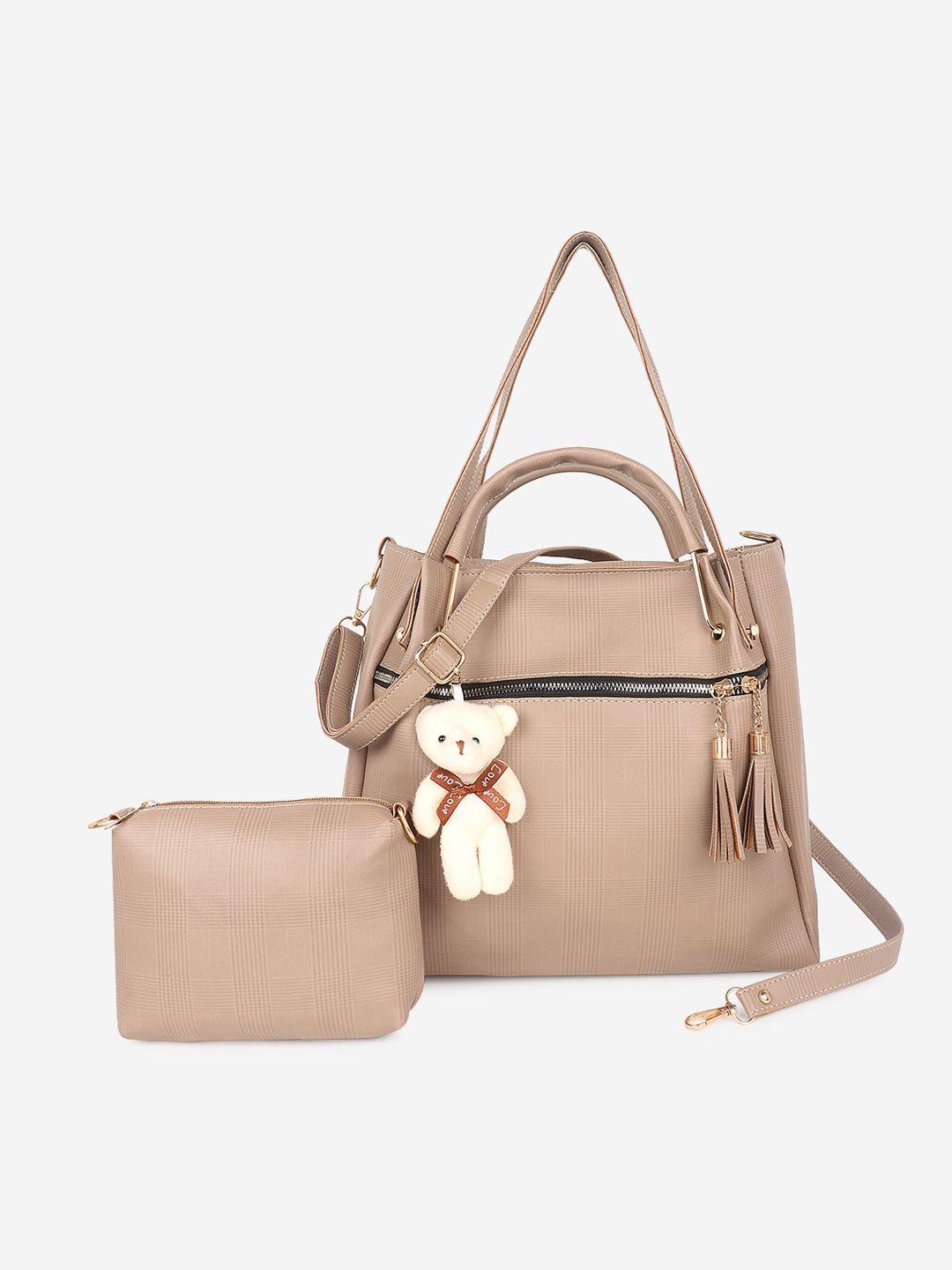 stropcarry beige pu bucket handheld bag with tasselled