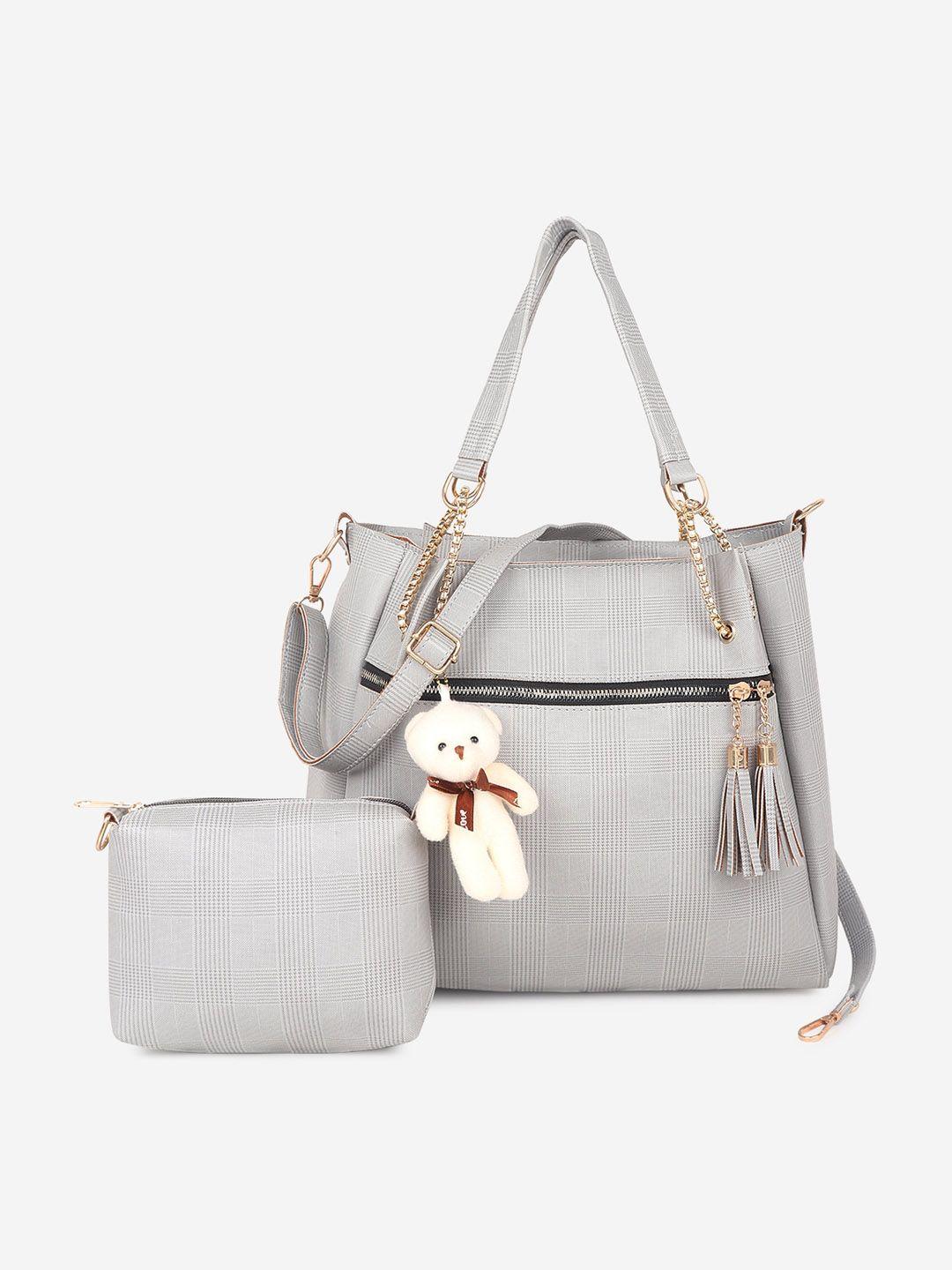 stropcarry grey pu structured handheld bag with tasselled