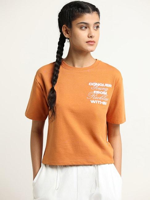 studiofit by westside orange slogan print t-shirt