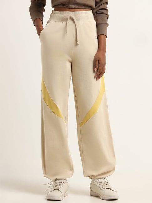 studiofit by westside beige mid rise straight fit track pants