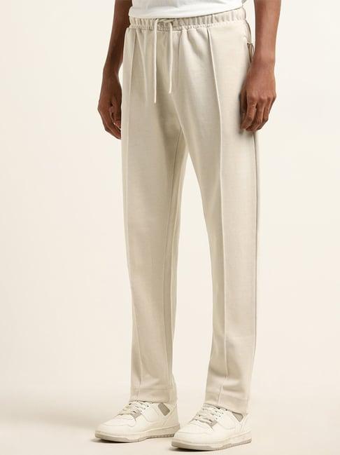 studiofit by westside light beige relaxed-fit mid-rise track pants