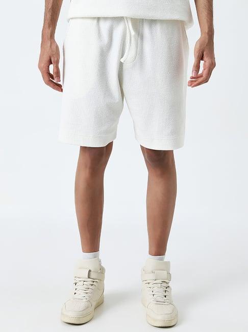 studiofit by westside off-white textured mid-rise relaxed-fit shorts