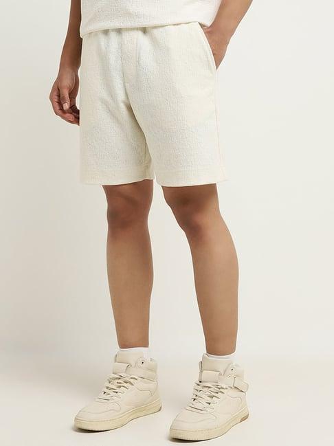 studiofit by westside off-white textured relaxed-fit mid-rise shorts