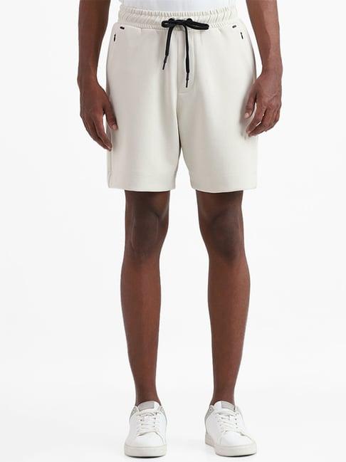 studiofit by westside solid off white relaxed fit shorts