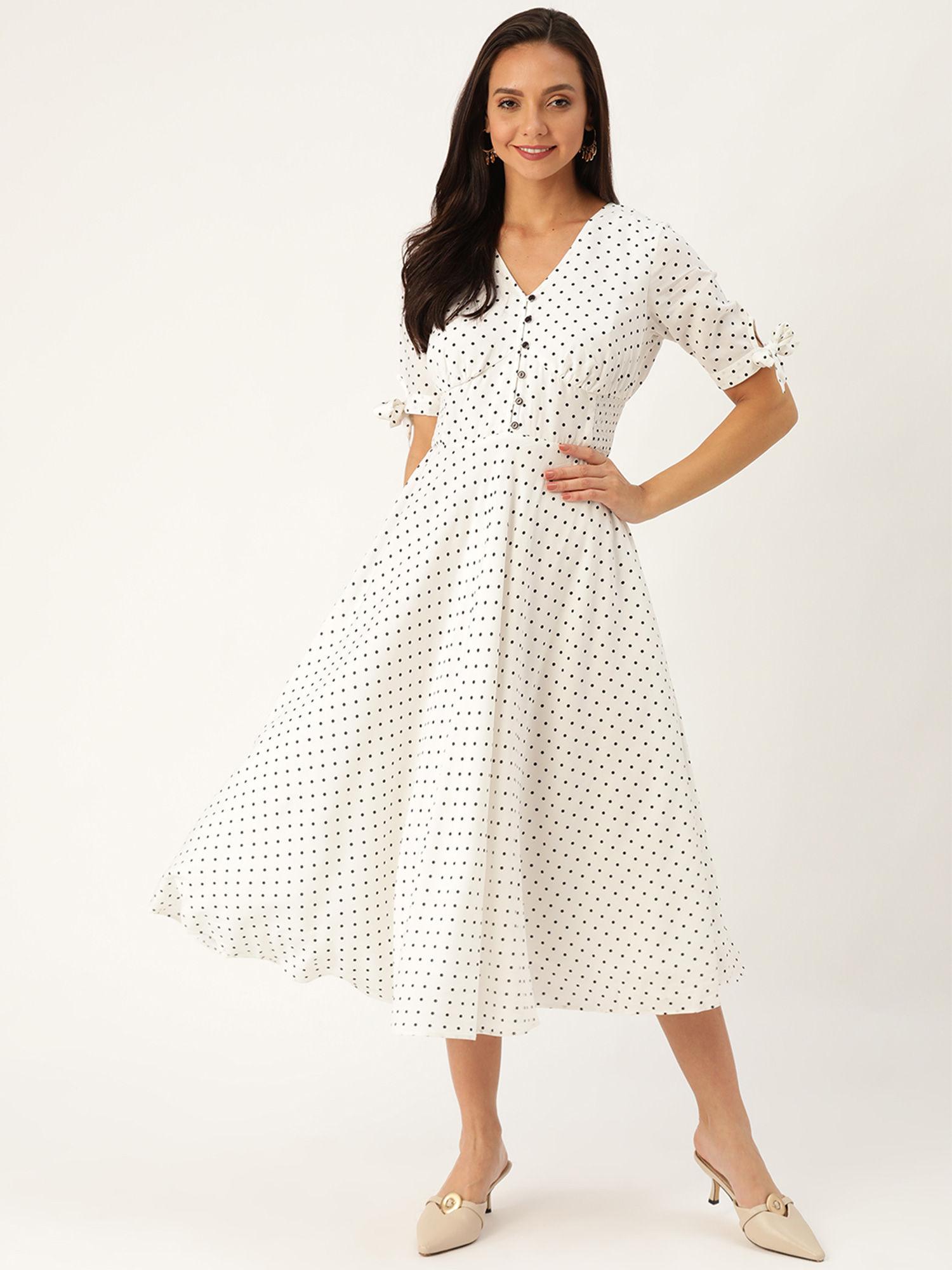 stunning in white polka dot dress