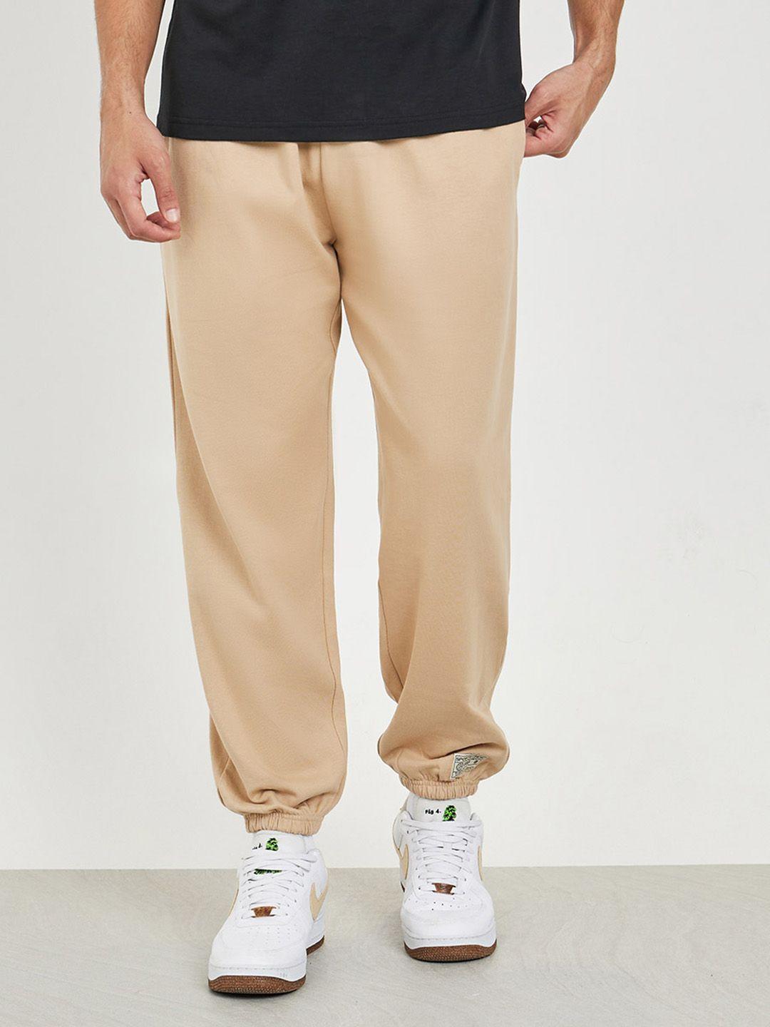 styli beige men relaxed fit pure cotton mid rise joggers