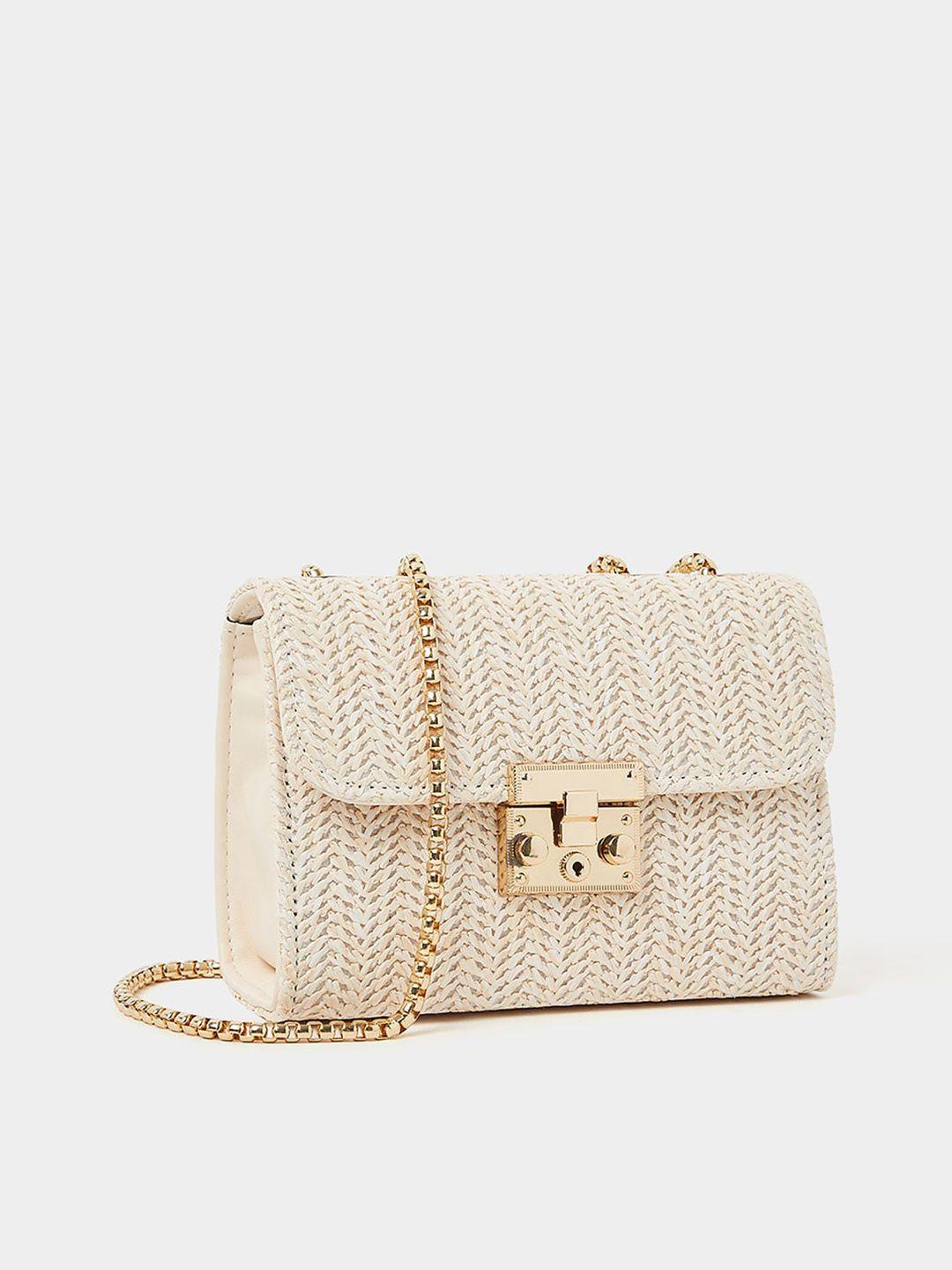styli textured sling bag with chain strap