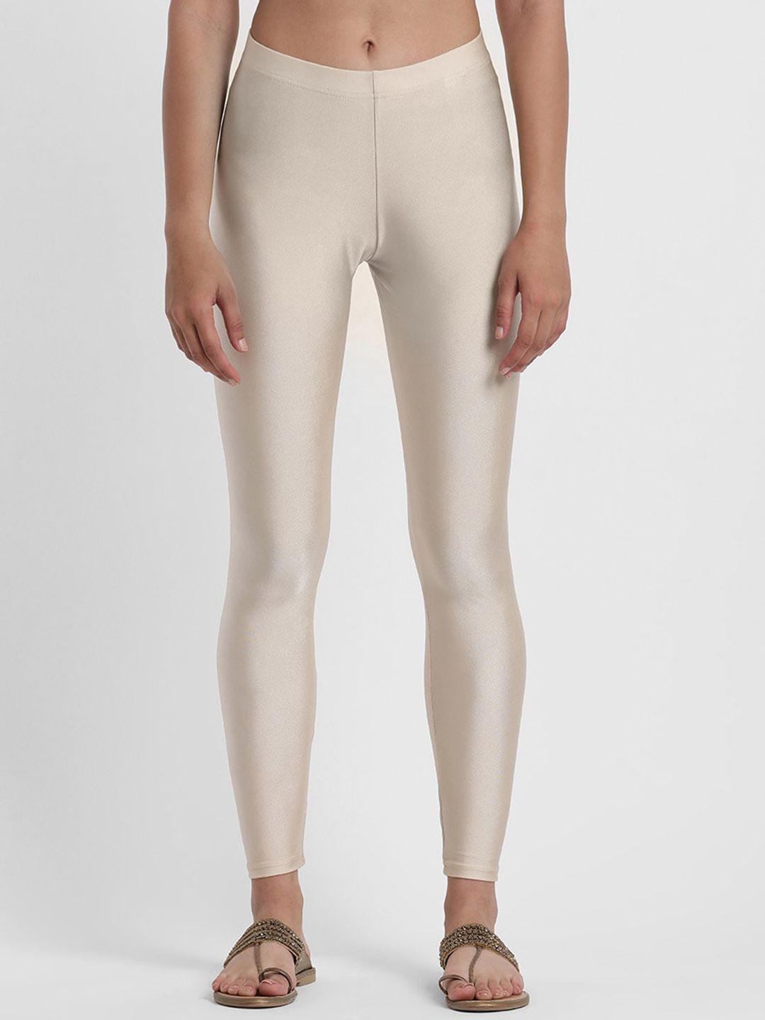 styli women cream-coloured ankle-length mid-rise shimmer nylon leggings