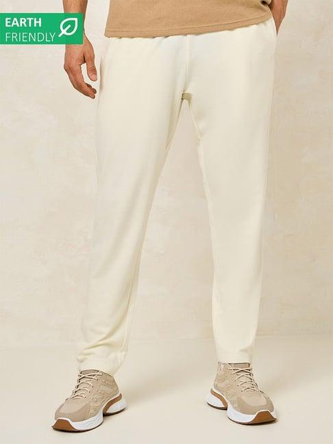 styli cream slim fit trackpants