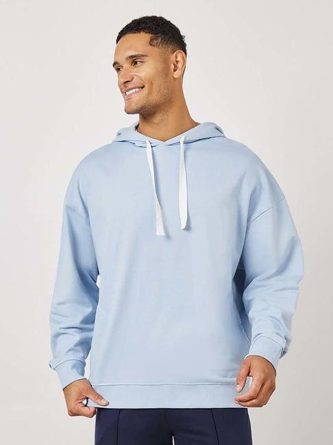 styli light blue relaxed fit printed oversized hooded sweatshirt