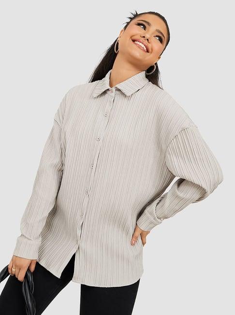 styli long sleeves textured woven oversized longline shirt