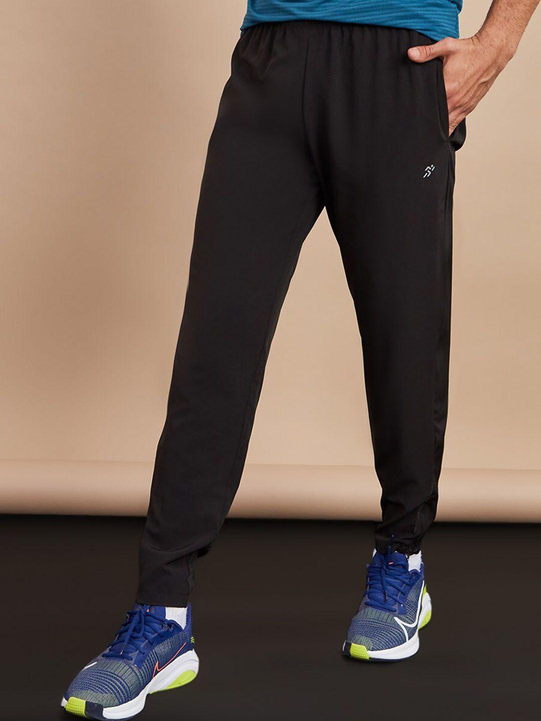 styli men woven running track pants with zip hem