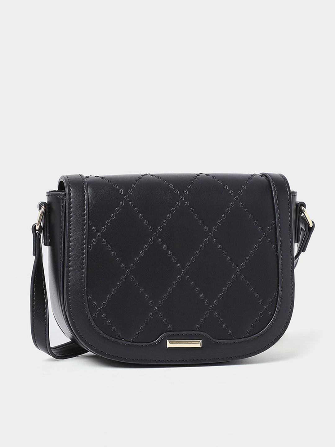 styli textured half moon sling bag with quilted