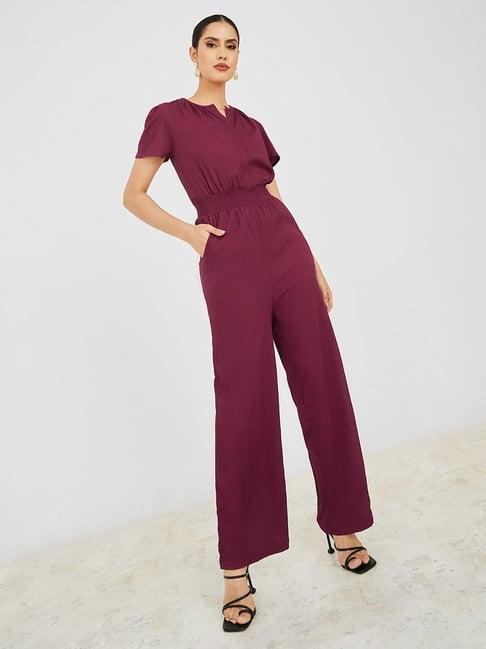 styli textured smocked waist jumpsuit