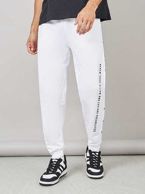 styli white relaxed fit printed cotton oversized joggers