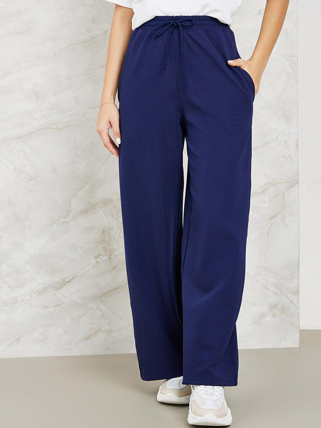 styli women navy blue wide leg mid-rise track pants