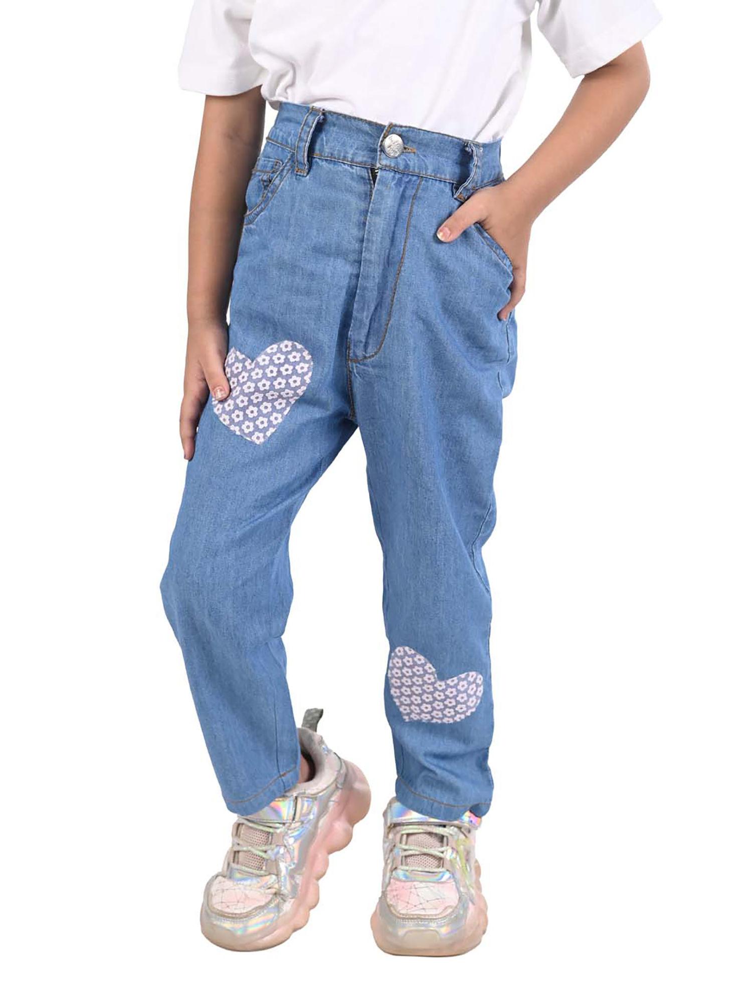 stylish girl blue denim jeans with heart fabric patch