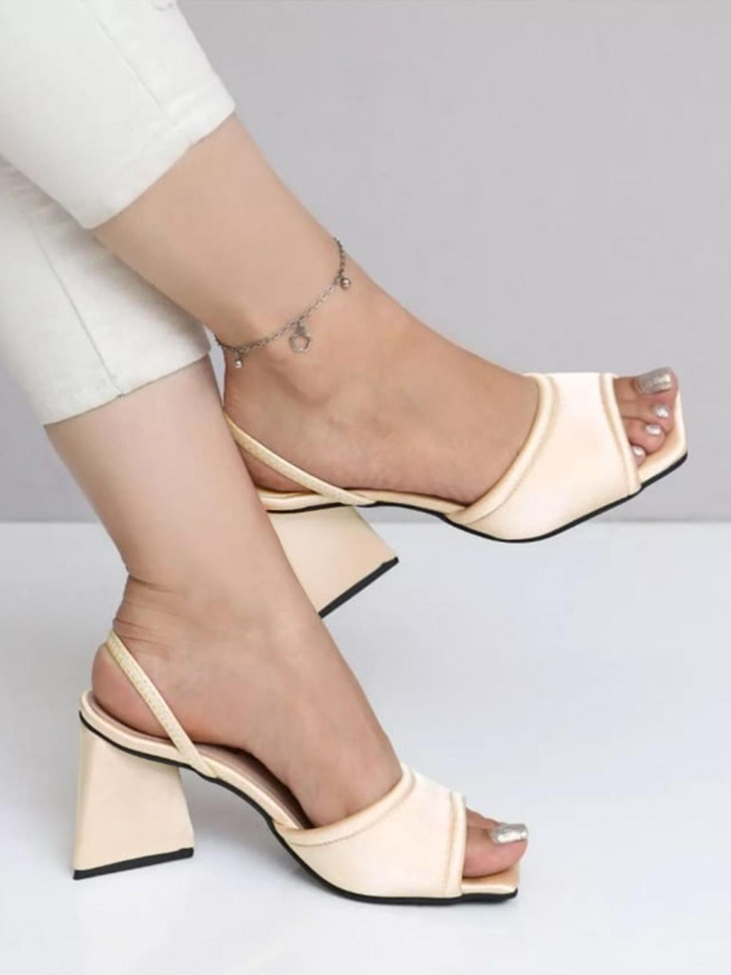 stylish golden pyramid heels for women
