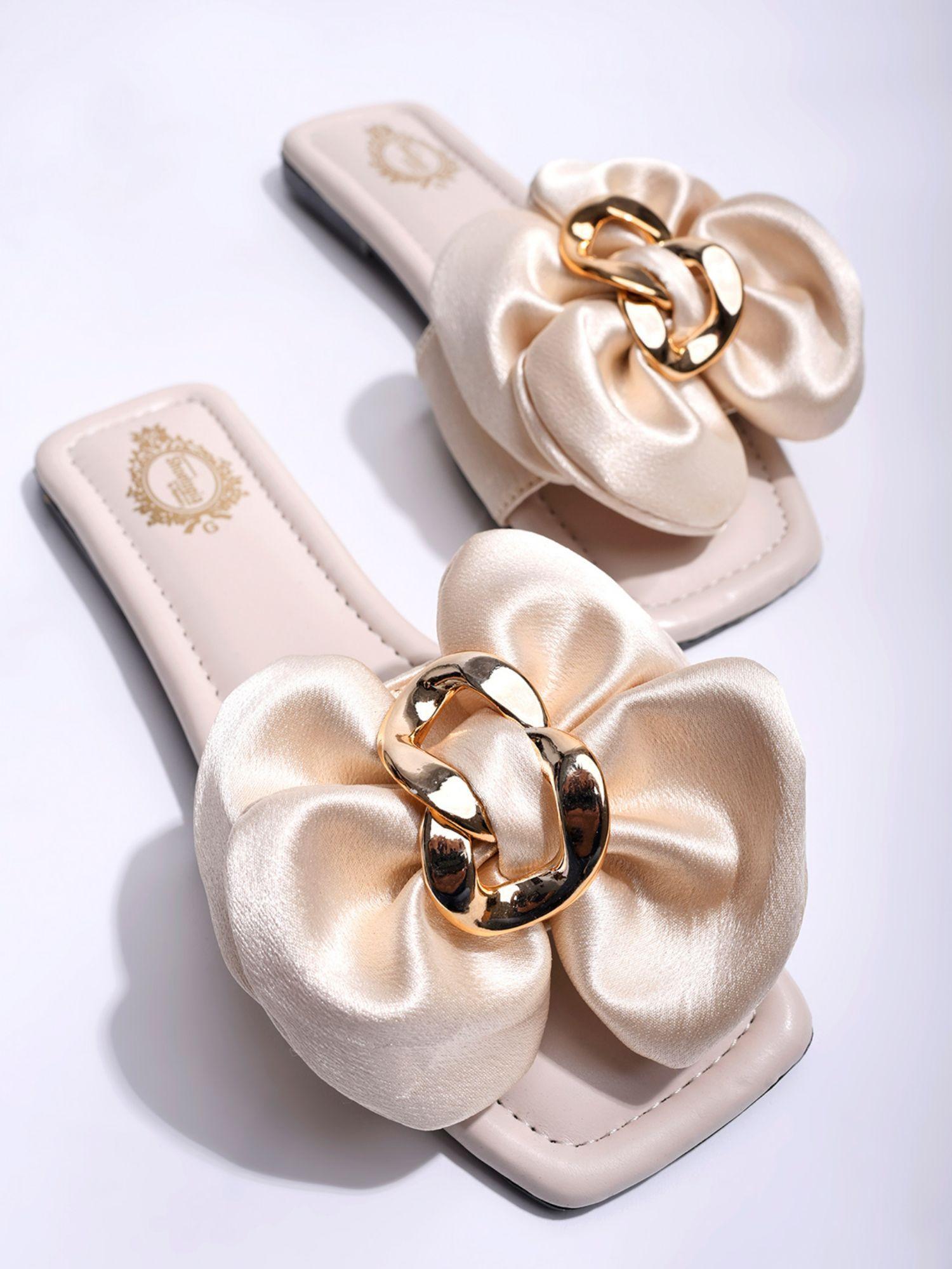 stylish oversized bow detailed cream flats