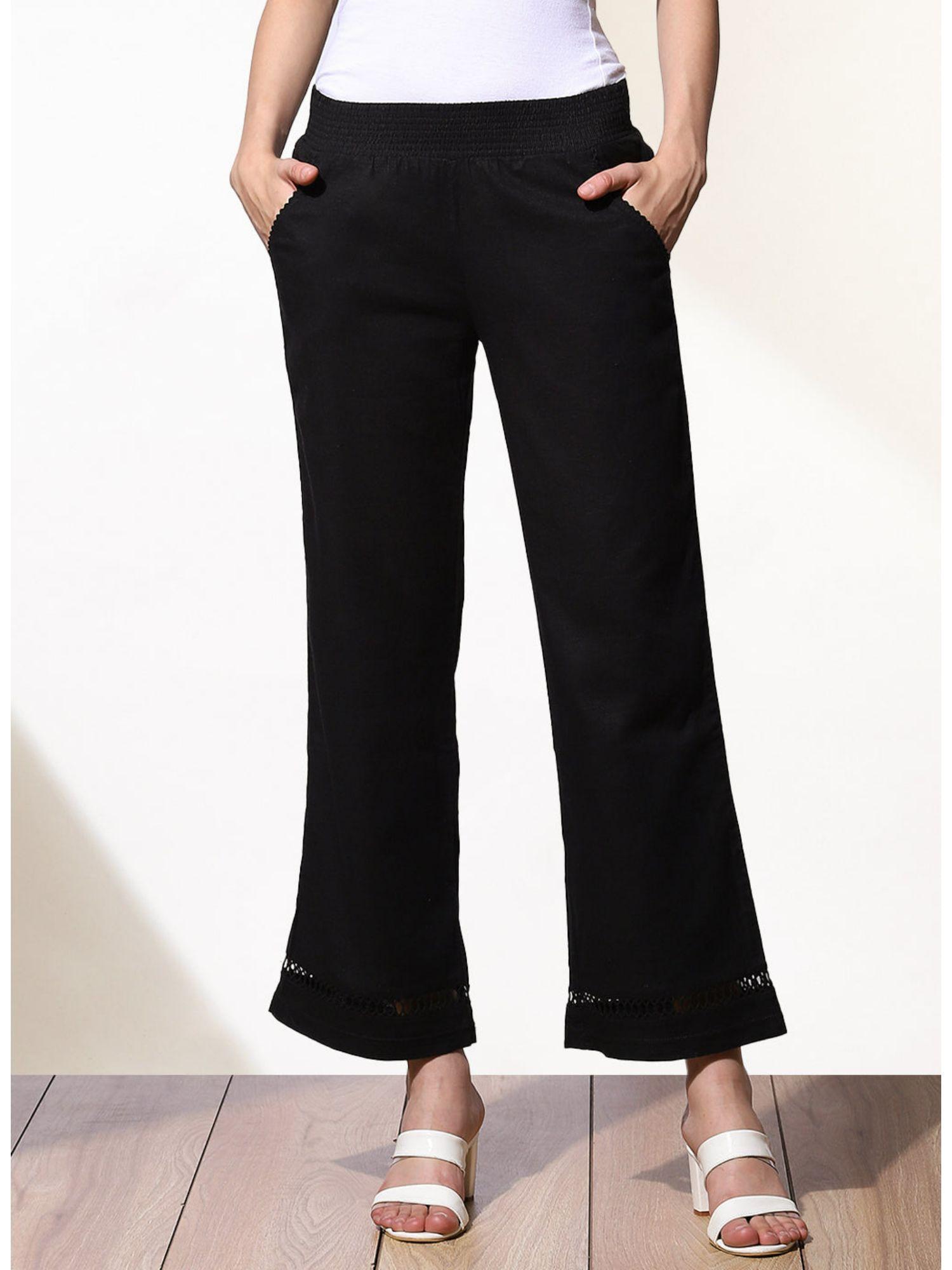 subtle black trousers with bell hem