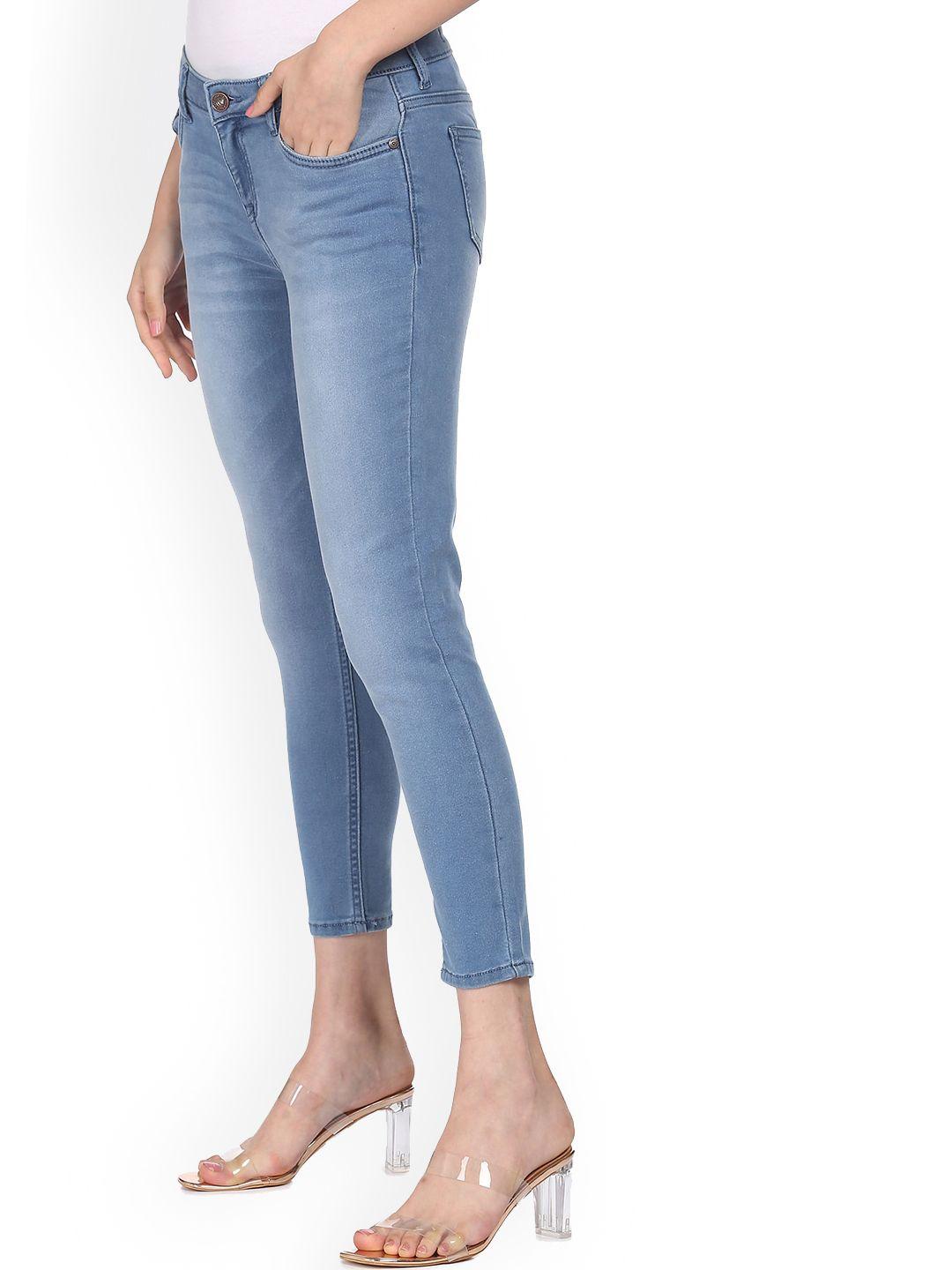 sugr women blue mid rise stone wash jeans